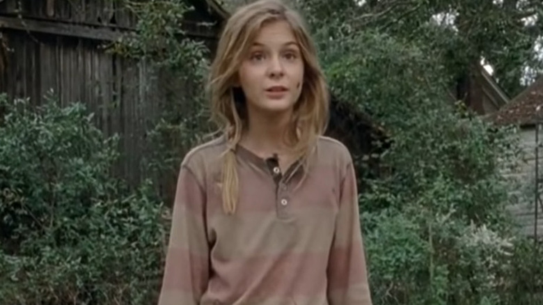 Lizzie Samuels holds bloody knife
