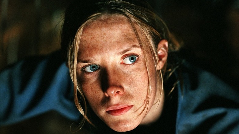 Crawler behind woman