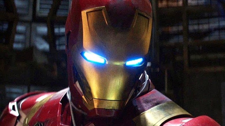 Helmeted Iron Man in close-up during battle