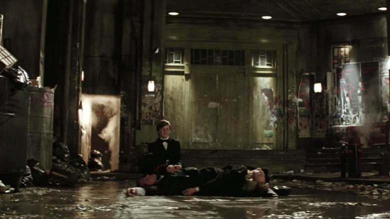 Bruce Wayne and his dead parents in Batman Begins