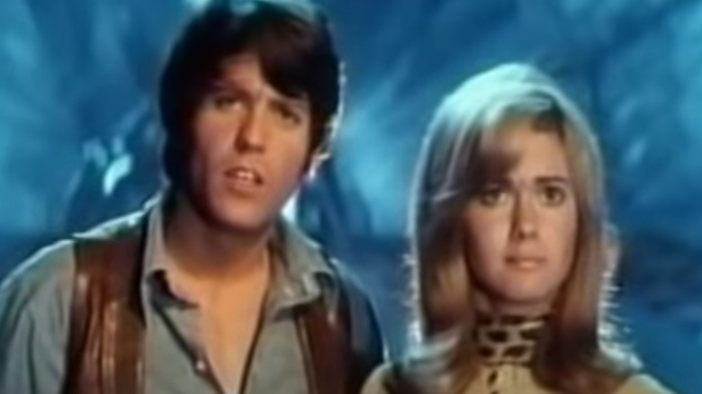 Olivia and Benny look perplexed