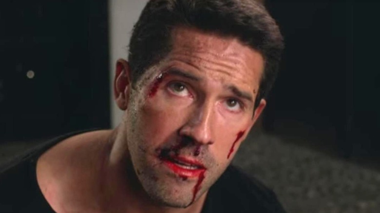 Scott Adkins with bloody nose