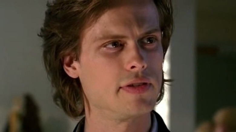 Spencer Reid grimacing