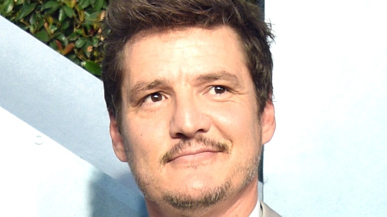 Pedro Pascal smiling at an event