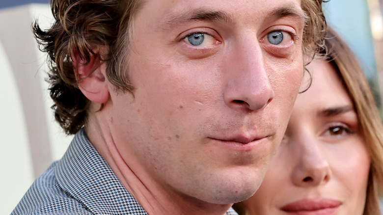 Jeremy Allen White smiling on red carpet