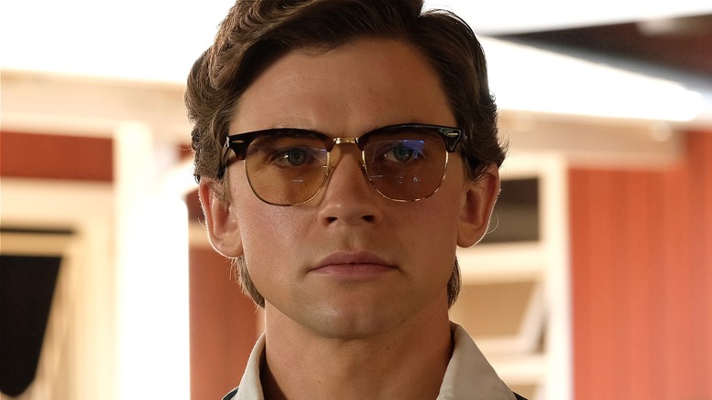 Bret looking serious in his glasses in The Shards