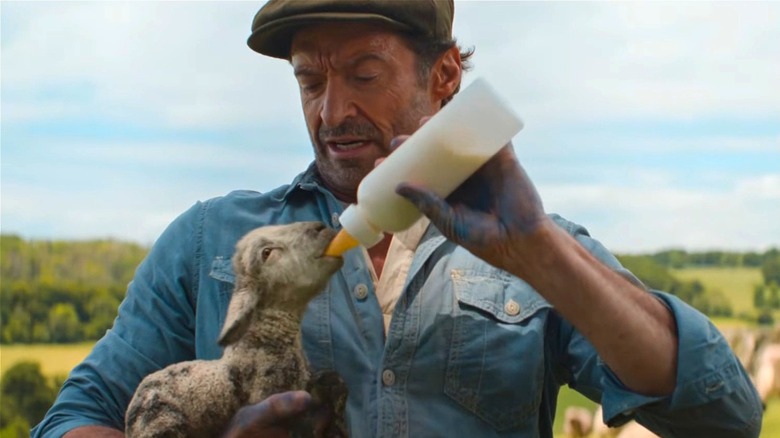 George Hardy giving a winter lamb milk in The Sheep Detectives