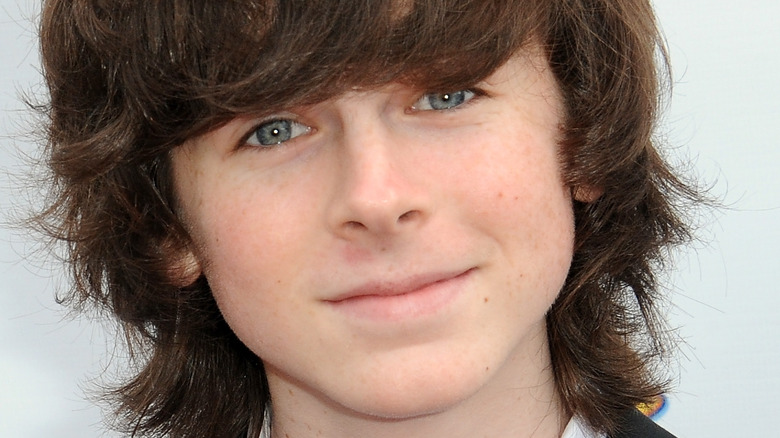 Chandler Riggs poses 