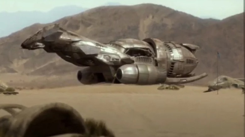 The Serenity taking off from a planet in Firefly (2002)