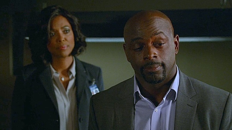 Aisha Tyler and Alimi Ballard in the office