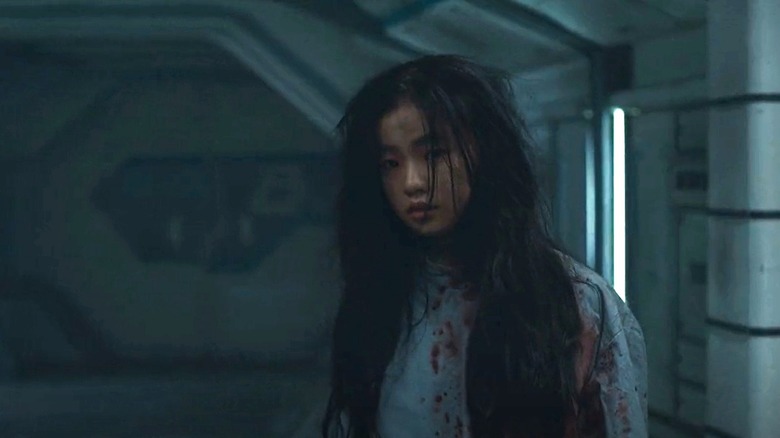 Luna 073 in a blood-stained shirt