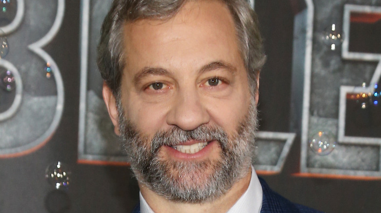 Judd Apatow smiling on red carpet for The Bubble