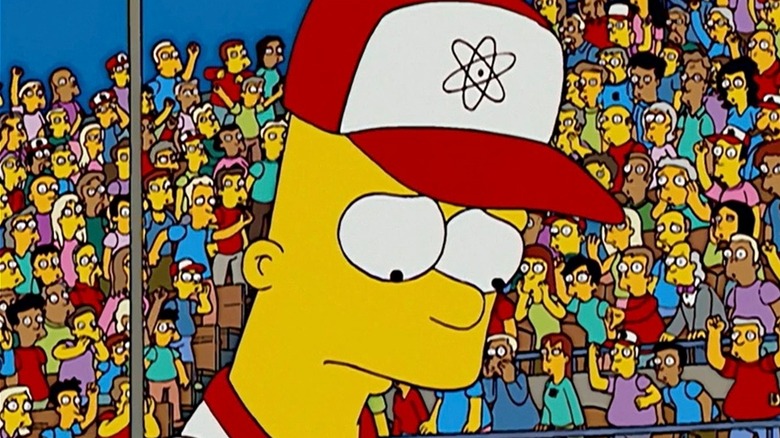 Bart Simpson looking sad as the crowd boos him in 