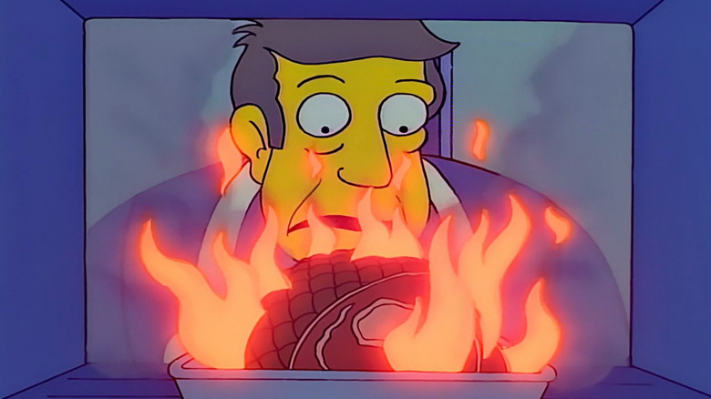 Principal Skinner watching his roast burning on The Simpsons