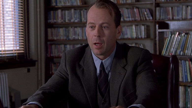 Malcolm Crowe at his desk