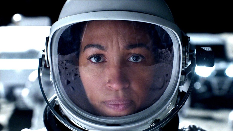 Angela Ali wearing astronaut helmet