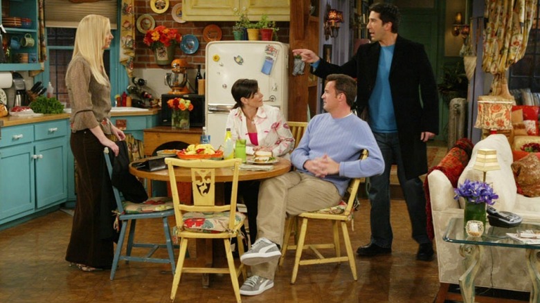 Friends cast at kitchen table