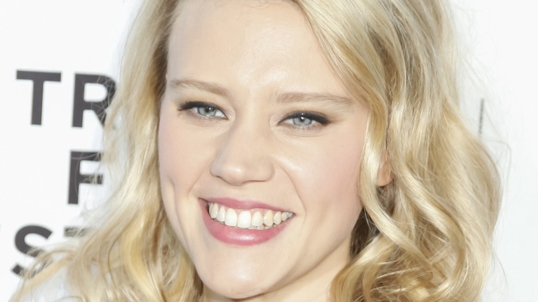 Kate McKinnon smiles