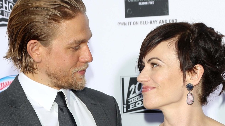 Charlie Hunnam Maggie Siff looking at each other