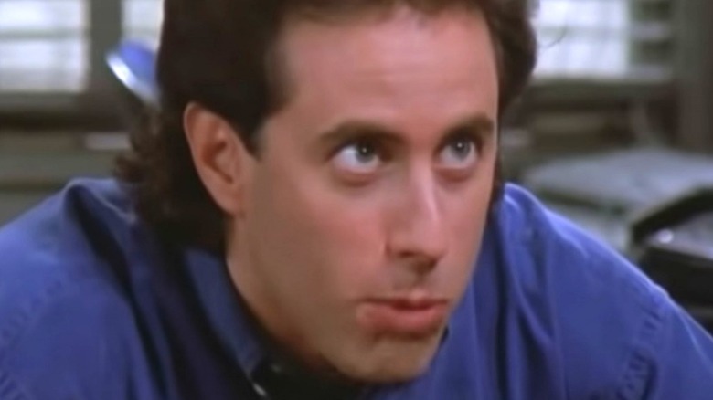 Jerry Seinfeld looking up on Seinfeld