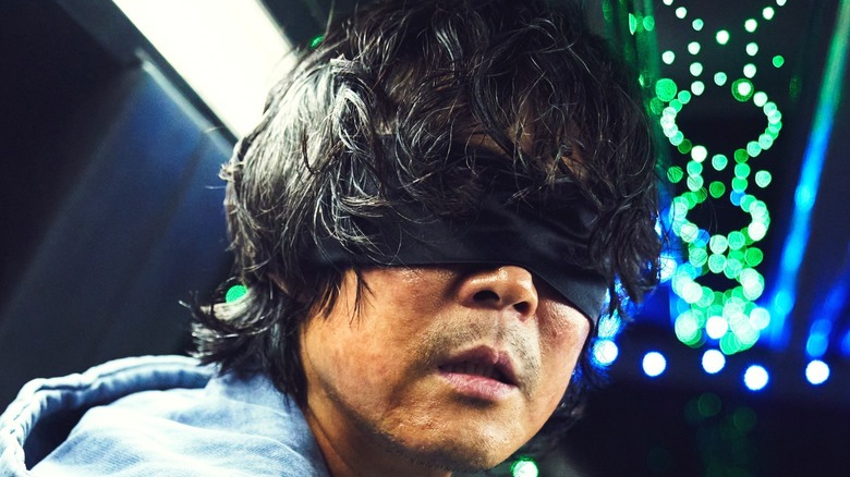 Seong Gi-hun with blindfold