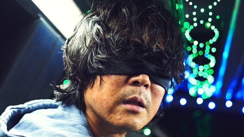 Seong Gi-hun with blindfold