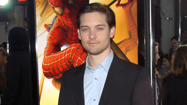 Tobey Maguire with Spider-Man poster 
