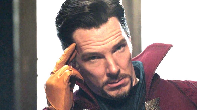 Benedict Cumberbatch does a thinky gesture as Doctor Strange