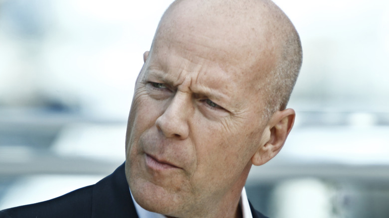 Bruce Willis looking to his right