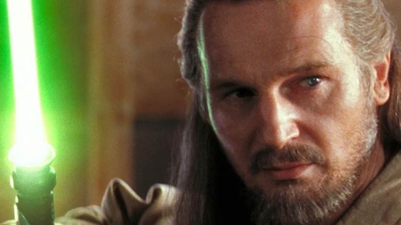 Qui-Gon Jinn with his lightsaber