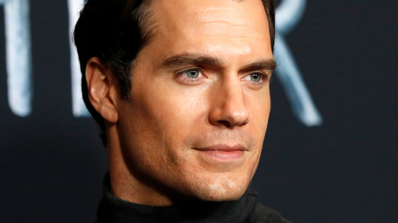 Henry Cavill posing on red carpet