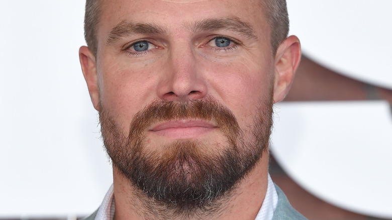 Stephen Amell staring