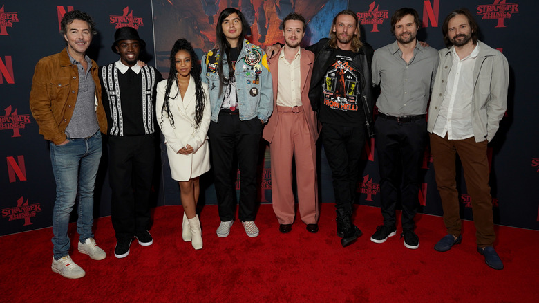 Stranger Things cast members stand together