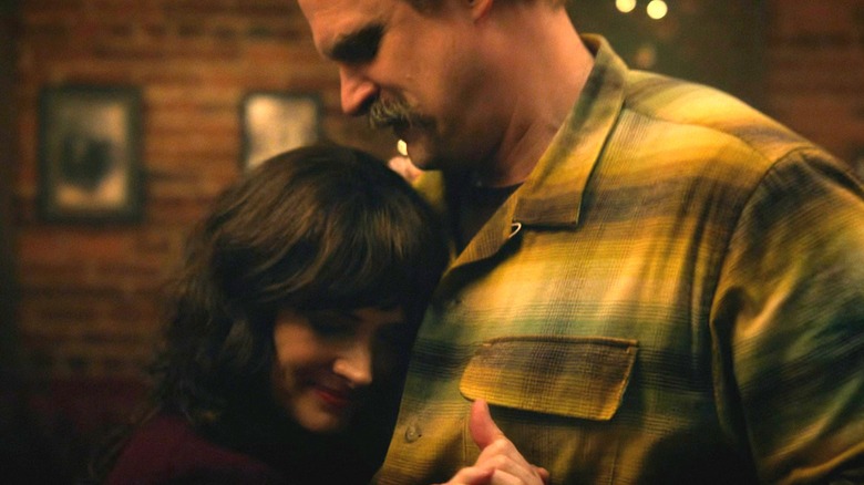 Joyce dancing with Hopper in Stranger Things