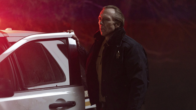 Sheriff Rotter standing outside of his cop car (2026)