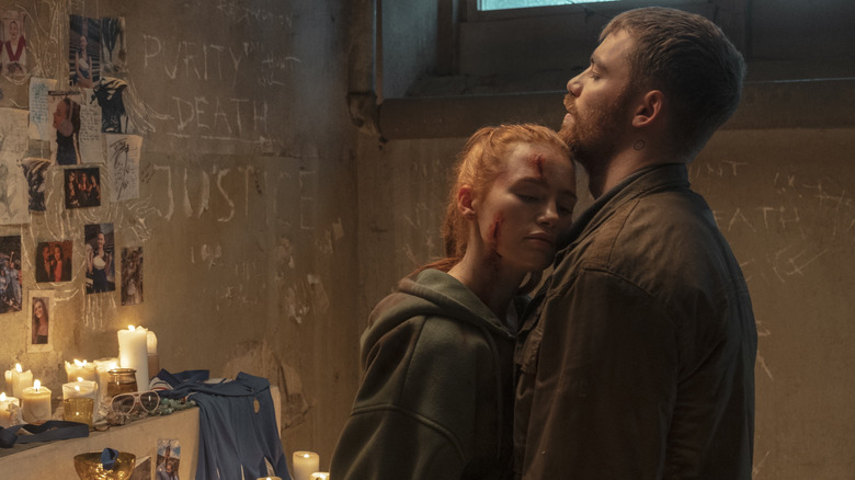 Maya with cuts on her face hugging Gregory (2026)