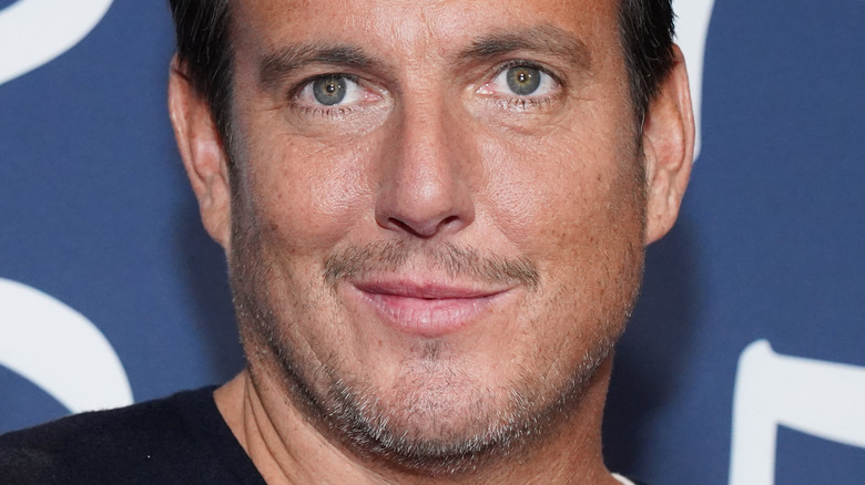 Will Arnett smirking