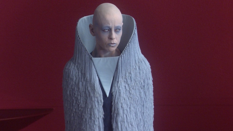 Sly Moore standing 