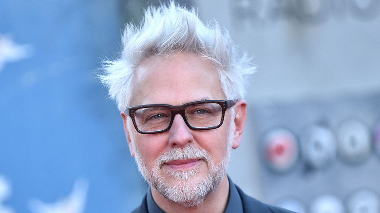 James Gunn with wood frame glasses and a beard