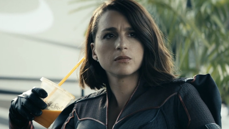 Stormfront holding a smoothie