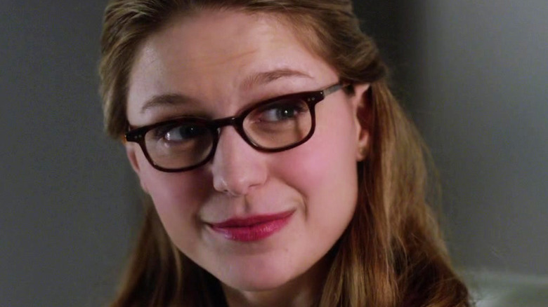 Kara Danvers smiling wearing glasses
