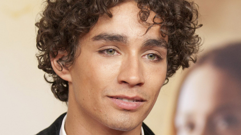 Robert Sheehan Nathan Young smiling