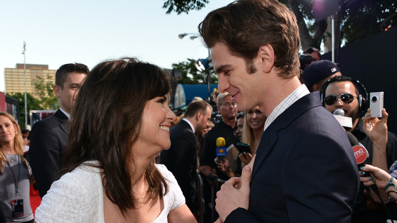 Sally Field and Andrew Garfield smiling at each other