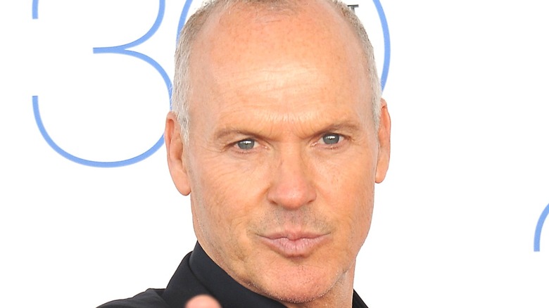 Michael Keaton poses