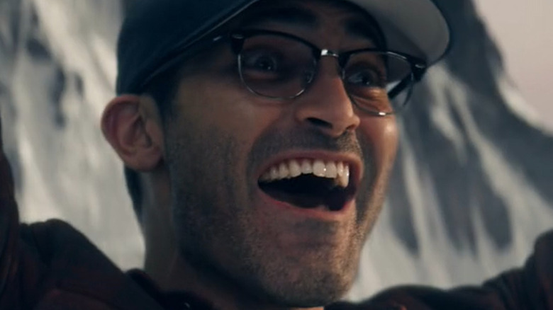 Clark Kent smiling with glasses
