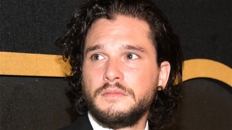 Kit Harington posing at event