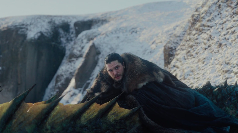 Jon Snow riding a dragon