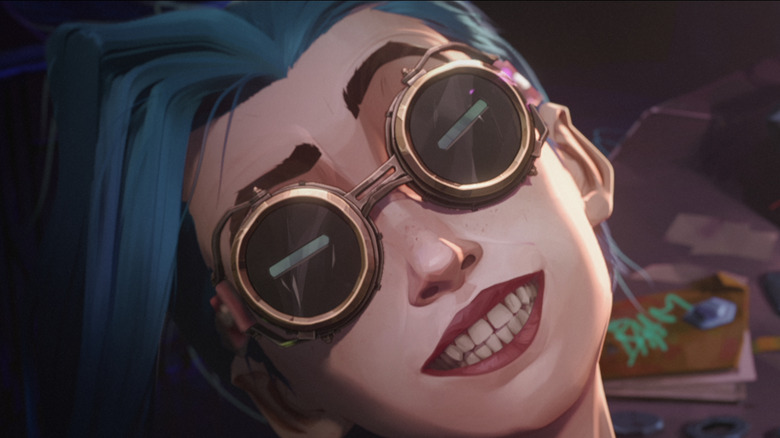 Jinx smiling in steampunk glasses