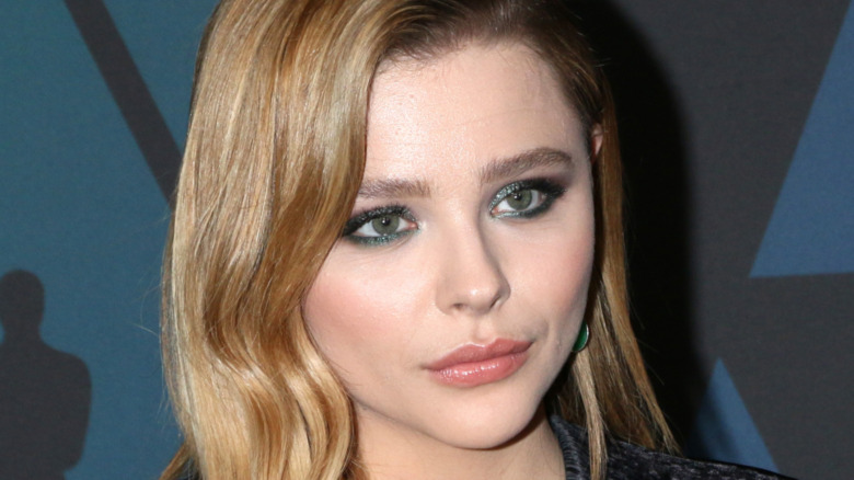 Moretz poses at an event