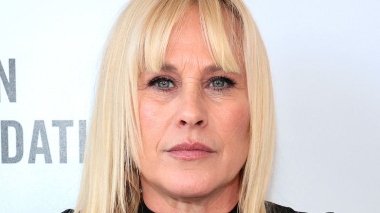 Stoic Patricia Arquette on red carpet